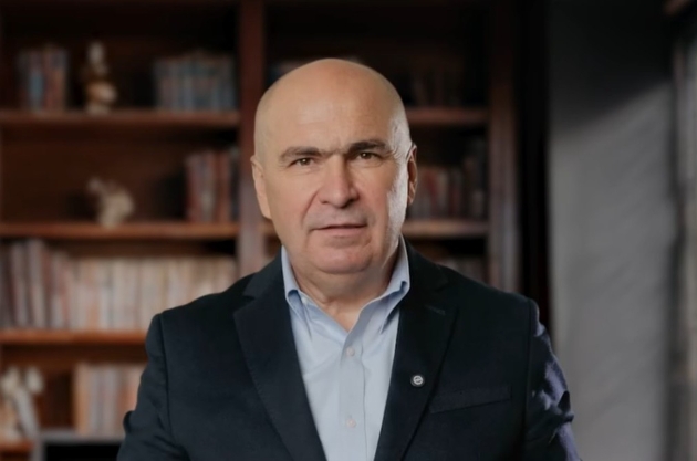 ilie bolojan, premierul romaniei, criticat pentru masurile de austeritate