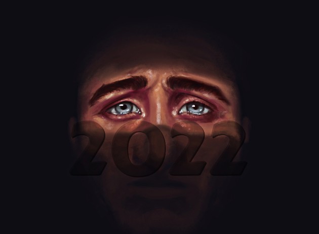Imagine cu o față în umbră și cu 2022 scris pe ea