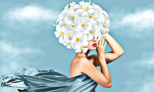 Ilustrație cu o femeie care are flori albe în loc de cap