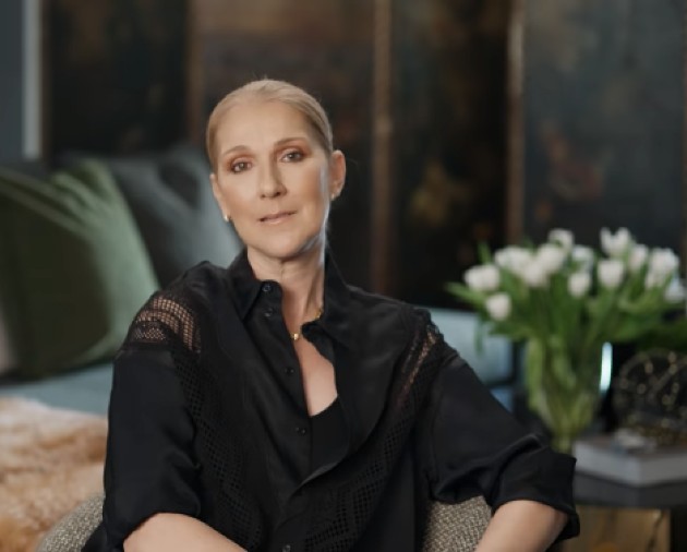 Imagine cu Celine Dion în timp ce declară că se amână din nou turneul din America De Nord