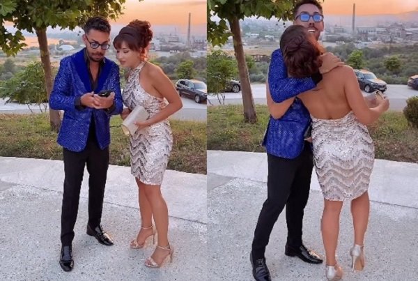 colaj imagini, Armin Nicoara imbracat cu sacou albastru si cu pantaloni negri aratandu-i ceva pe telefon Adinei Miuleasa, imbracata cu rochie scurta stralucitoare argintie, cu sandale argintii cu toc, in spatele lor aflandu-se copaci si observandu-se un peisaj la apusul soarelui cu locuinte si Armin Nicoara luand-o pe Adina Miuleasa de dupa gat, aceasta stand intoarsa cu spatele, intr-o ipostaza ce a starnit controverse
