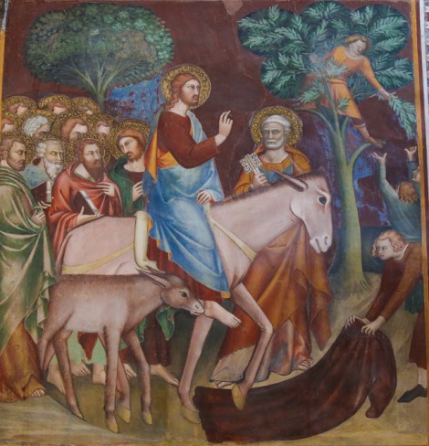 pictura cu iisus care intra in ierusalim calare pe un asin si este intampinat cu oameni cu frunze