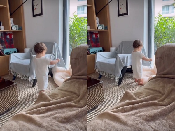 baiat theo rose imbracat in body merge singur prin casa