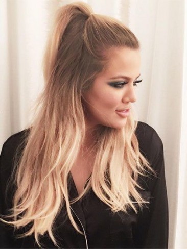 khloe kardashian cu parul prins in coada