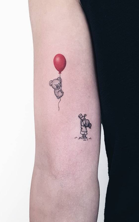 tatuaje braț-model fetiță și urs panda cu balon