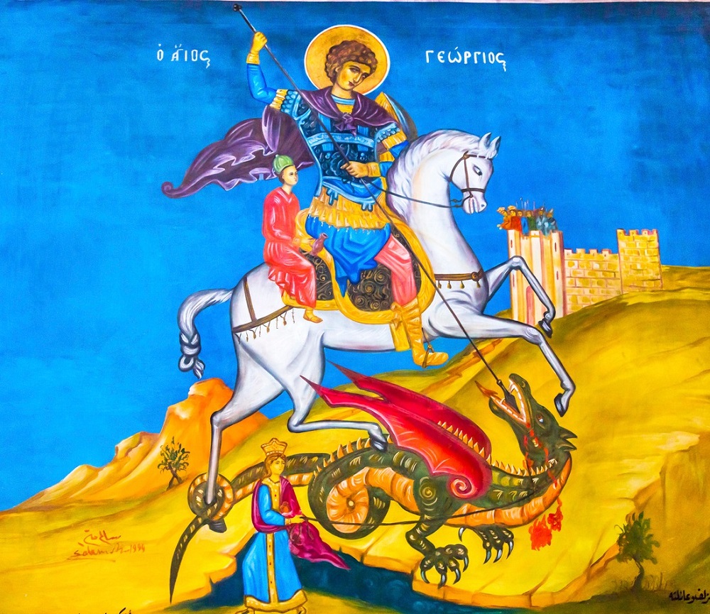 Madaba, Iordania - 25 noiembrie 2016. Ilustrație a legendei bătăliei Sfântului Gheorghe cu dragonul, pictată în Biserica Ortodoxă din Madaba, Iordania - care a fost construită la sfârșitul anilor 1800 și care adăpostește multe mozaicuri celebre