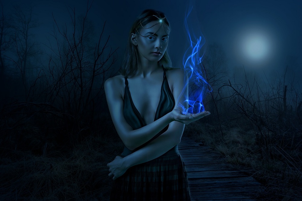 Ilustrație cu o femeie care ține o flacără albastră în mână.