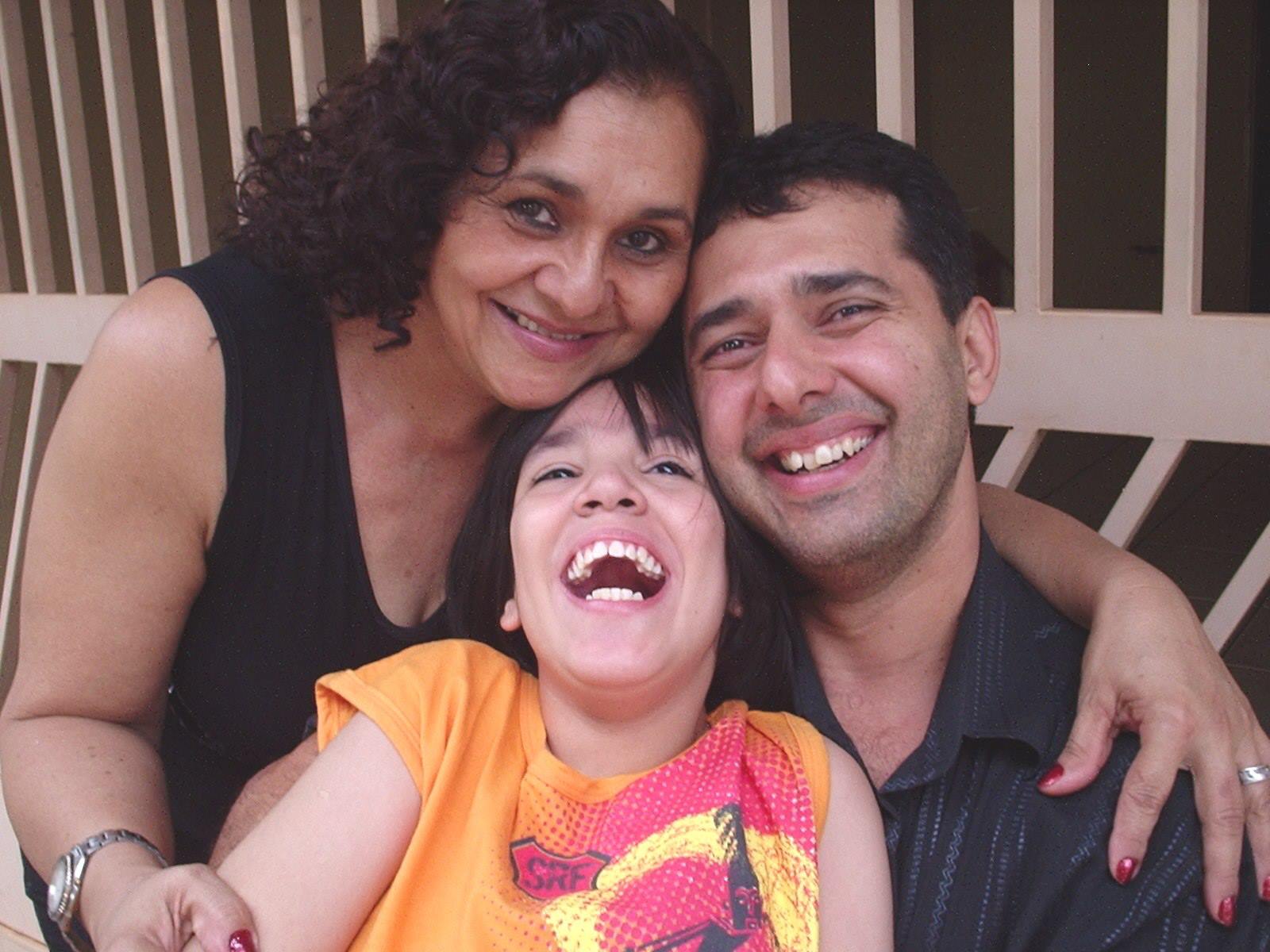 Fotografie din 2013 cu Davyd alături de Moisés și de mama acestuia, 