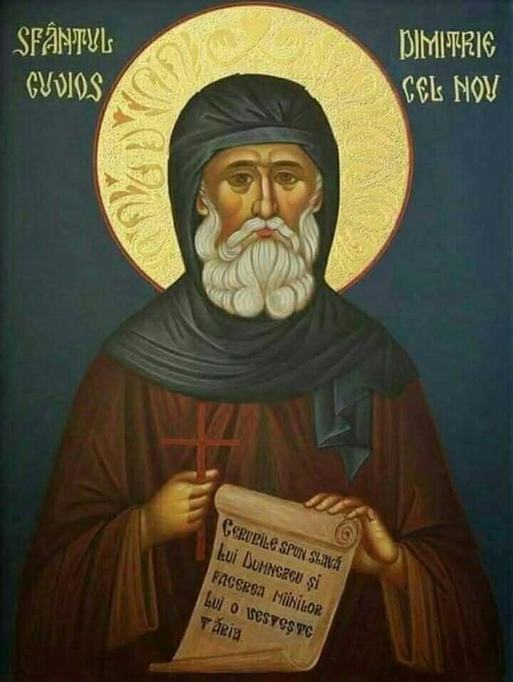 Icoană cu Sfântul Dimitrie cel Nou îmbrăcat în roșu și negru, ținând în mână o cruce și un papirus