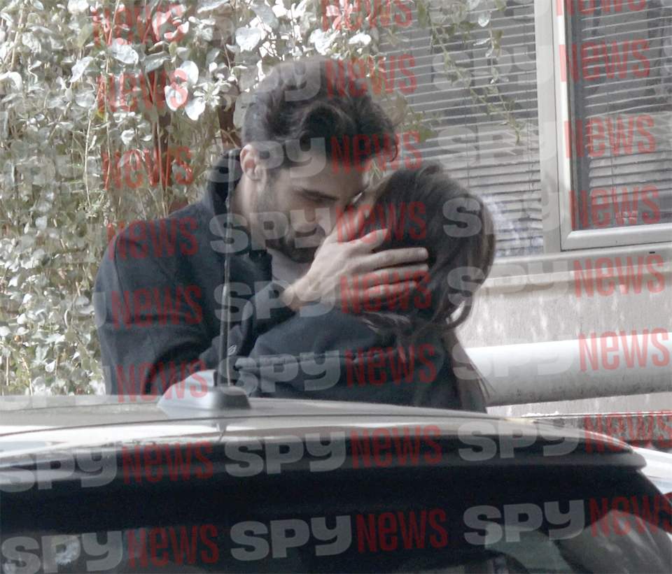 Diana Bart și Daniel Nuță sărutându-se pasional lângă mașină
