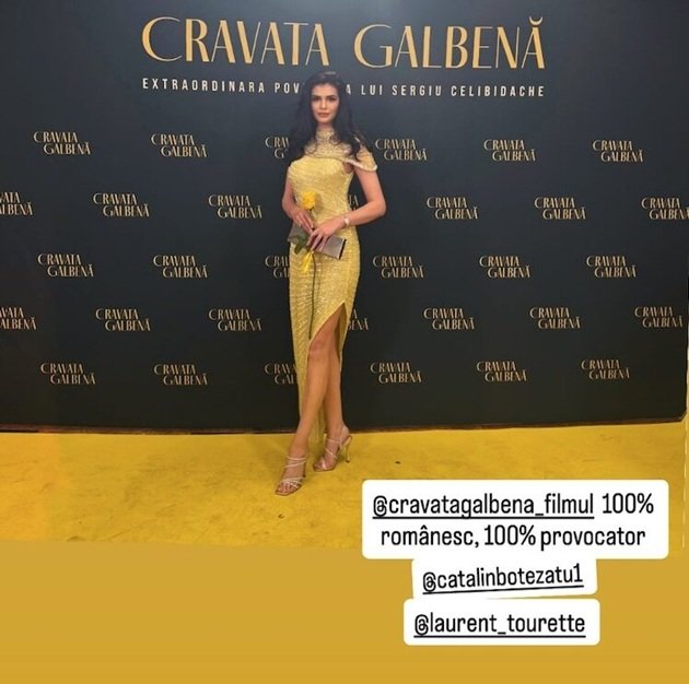 Monica Gabor pe covorul galben la premiera filmului „Cravata Galbenă”, îmbrăcată într-o rochie galbenă, de gală, cu accesorii care o fac să strălucească și îi pun frumusețea în valoare