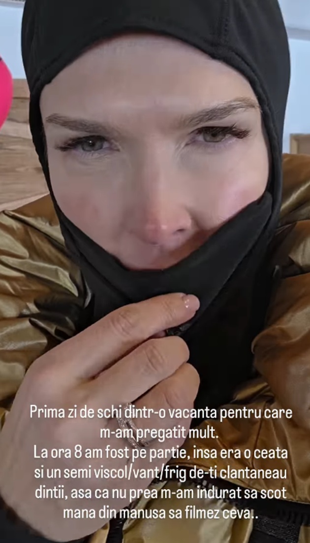 Monica Bîrlădeanu la schi, îmbrăcată gros, cu fața și capul acoperite și protejate de frig, vânt și ninsoare