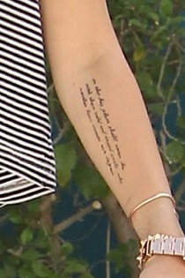 miley arm tattoo