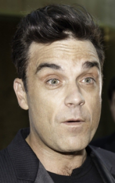 Robbie Williams vrea sa renunte la muzica pentru a deveni mecanic auto!
