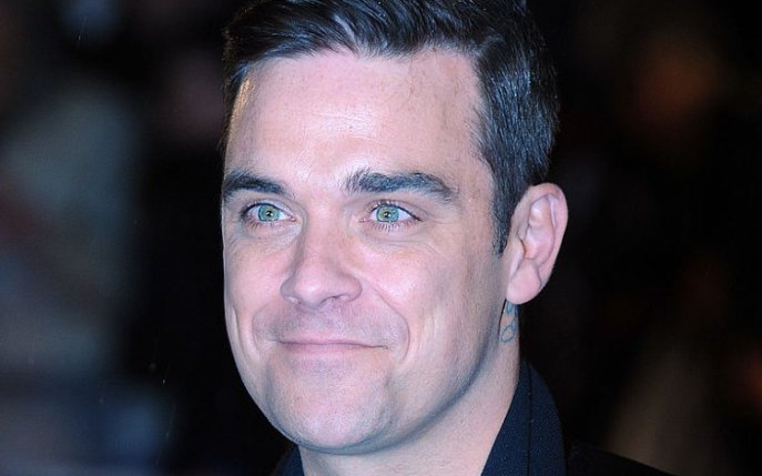 Tumultoasa viață amoroasă a neîmblânzitului Robbie Williams. Cine este femeia care a reușit să-l "îmblânzească"