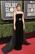 Dakota Johnson într-o rochie Gucci