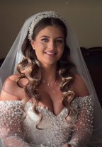 Denisa Coțolan a purtat două rochii cu umerii goi în ziua nunții cu Iancu Sterp