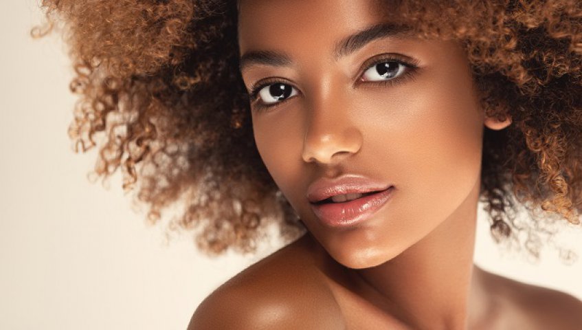 8. Femeile din Africa de Est se dau pe piele cu unt de shea